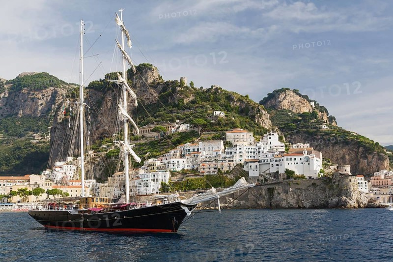 Tall ship at anchor in front of Amalfi