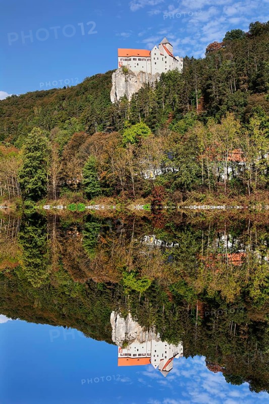 Castle Prunn reflected in the Rhine-Main-Danube Canal in Riedenburg