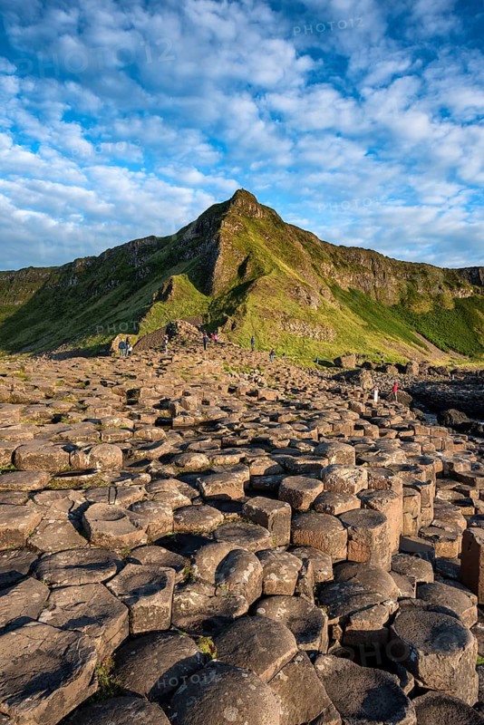 Basalt columns by the coast at sunset
