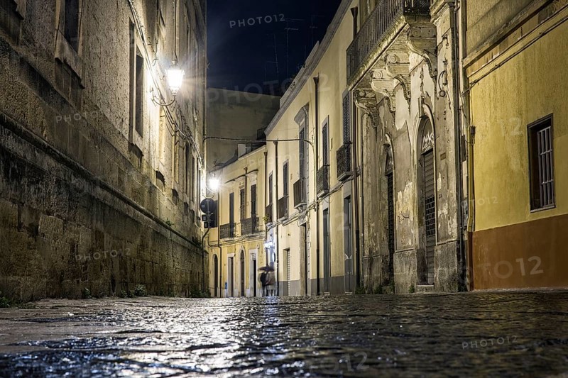 Street at night with disappearing couple