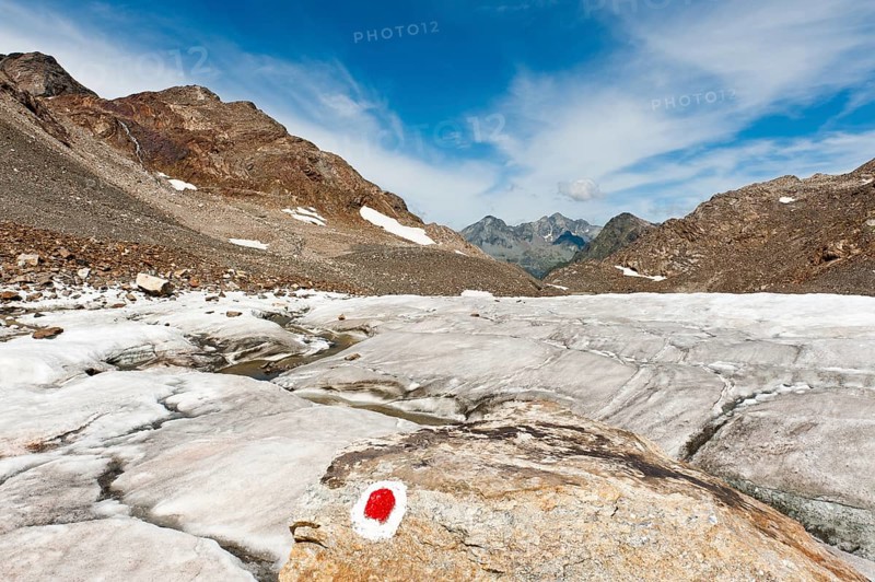 Marked path over glacier tongue below the Schwarzwand summit