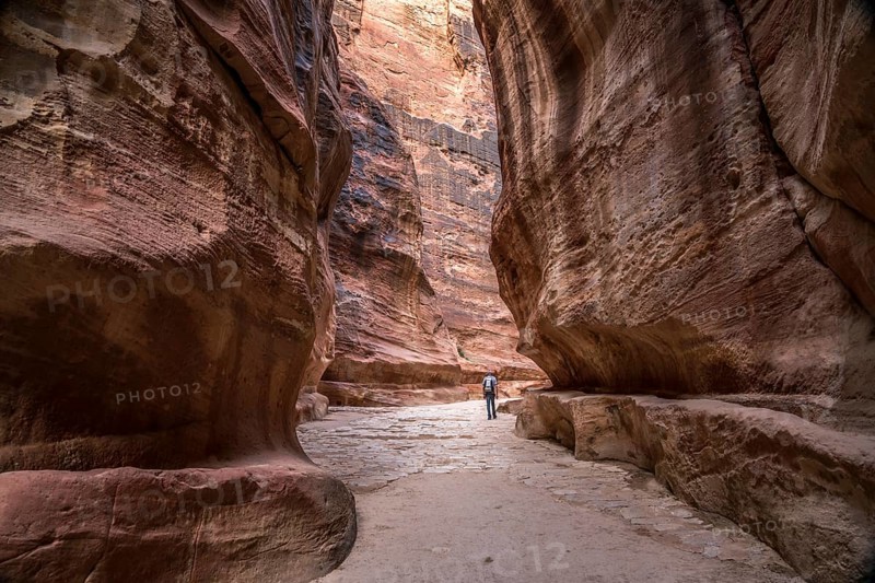The narrow canyon Siq leads to Petra