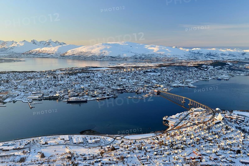 Snowy town with bridge