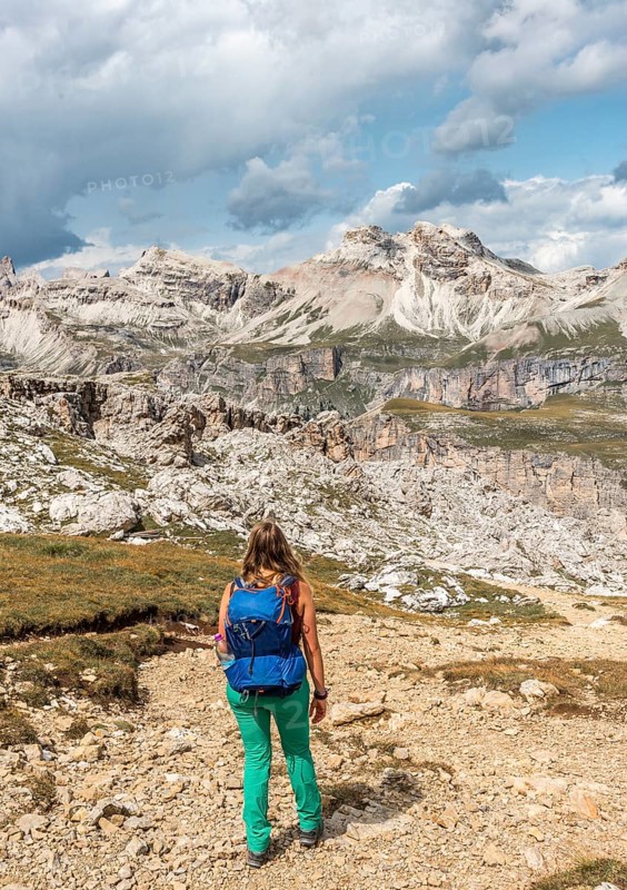 Woman on footpath to Passo Cir