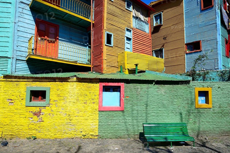 Colorfully painted houses made of corrugated sheet iron