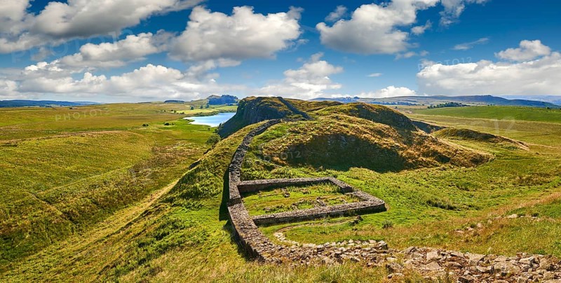 Hadrian's Wall with foundation walls of former watchtower