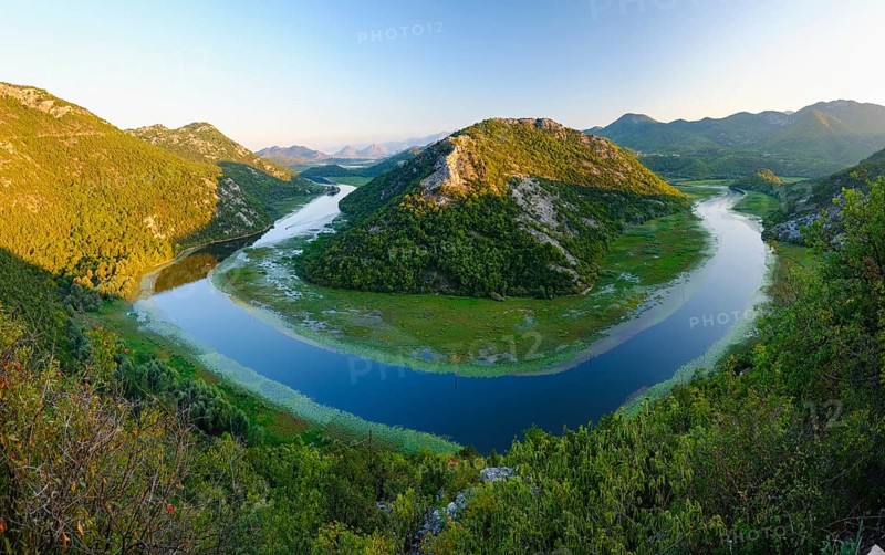 River bend of the river Rijeka Crnojevica in the evening light