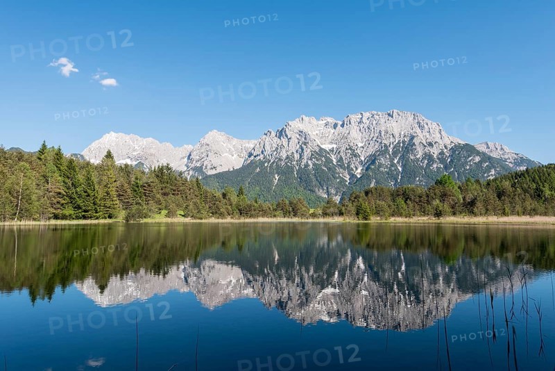 Western Karwendelspitze is reflected in the Luttensee