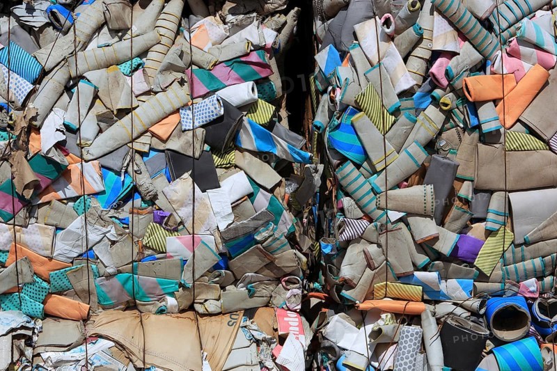 Waste paper for recycling in a recycling plant