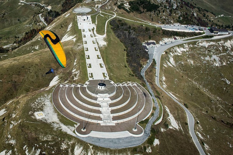 Paraglider over Monument at Monte Grappa