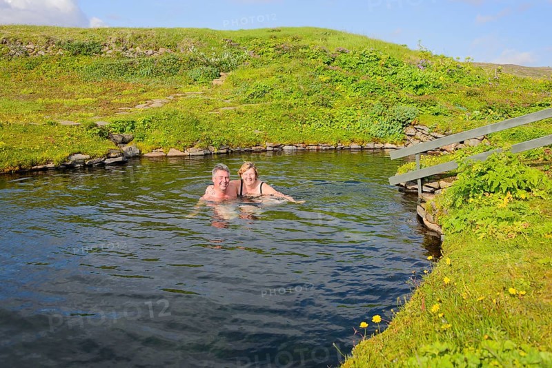 Tourists bathing in spring