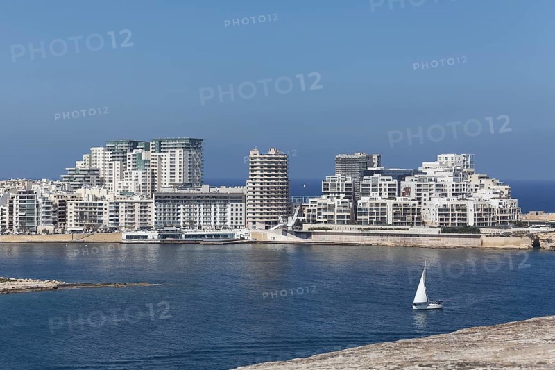 Spit of land with office and apartment buildings