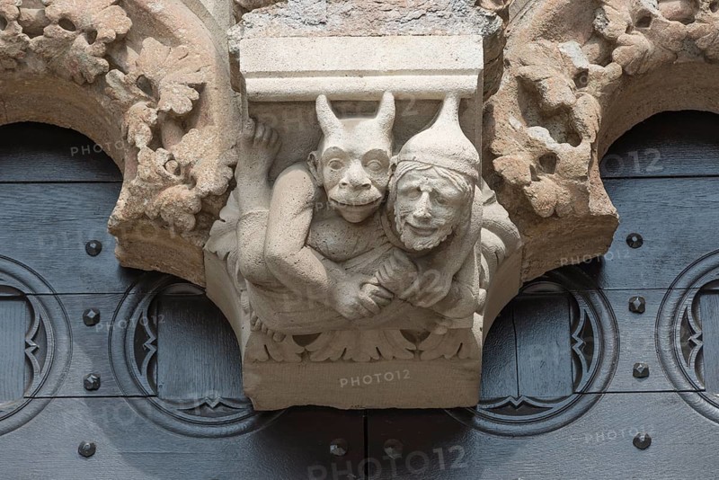 Devil relief on the portal