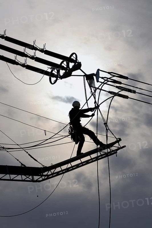 High-voltage engineer at work