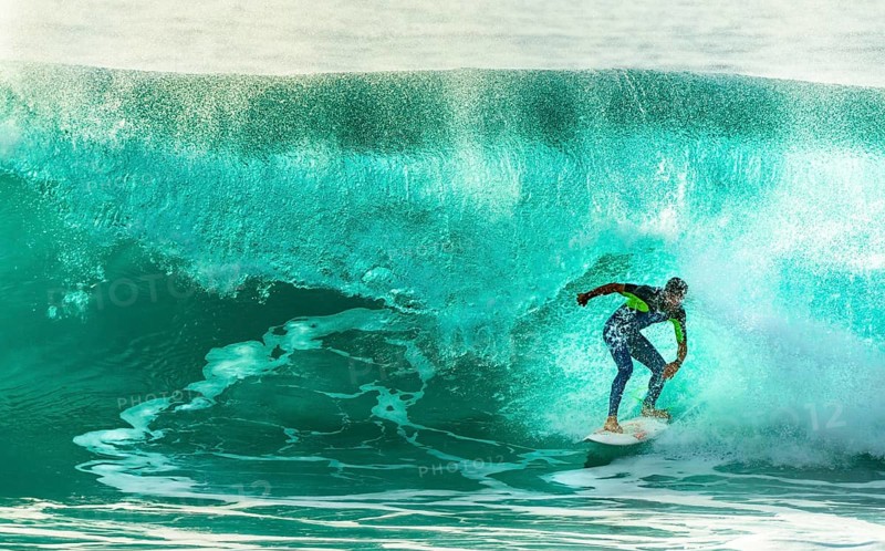 Surfer with large wave