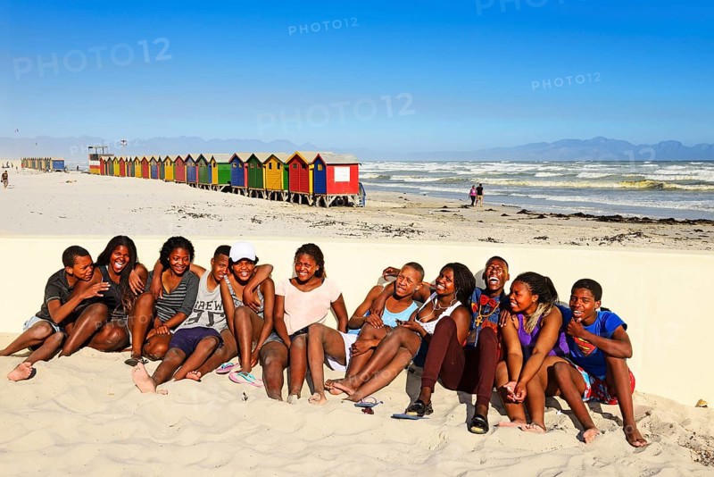 Happy black teenagers on the beach