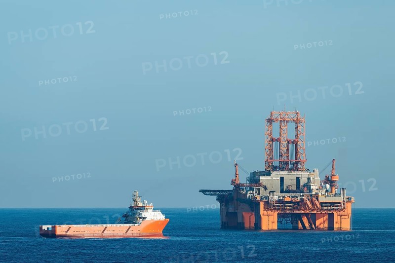 Supply vessel Normand Aurora next to West Phoenix oil rig