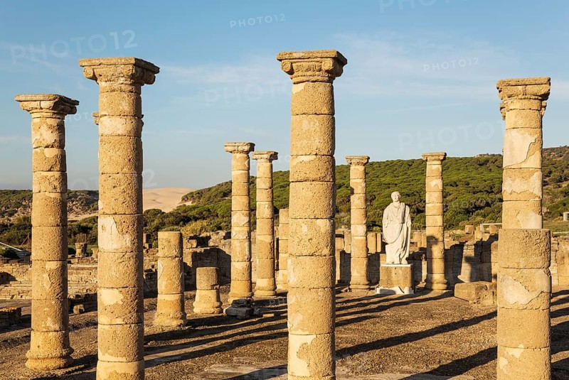 Ruins with statue of emperor Trajano