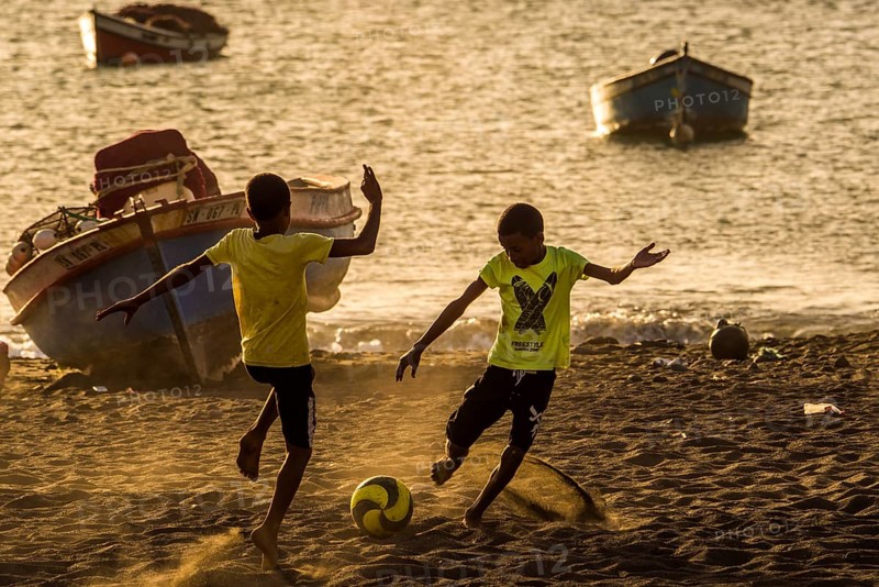 Teenager playing soccer