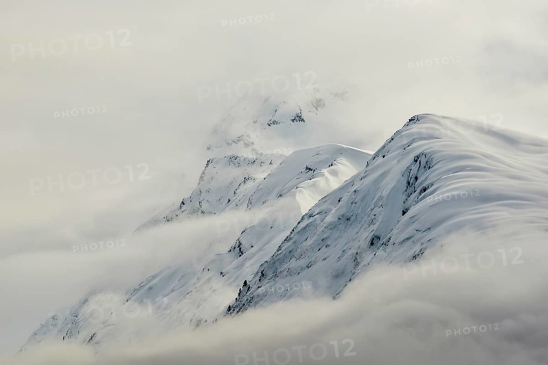 Mountains with snow and clouds