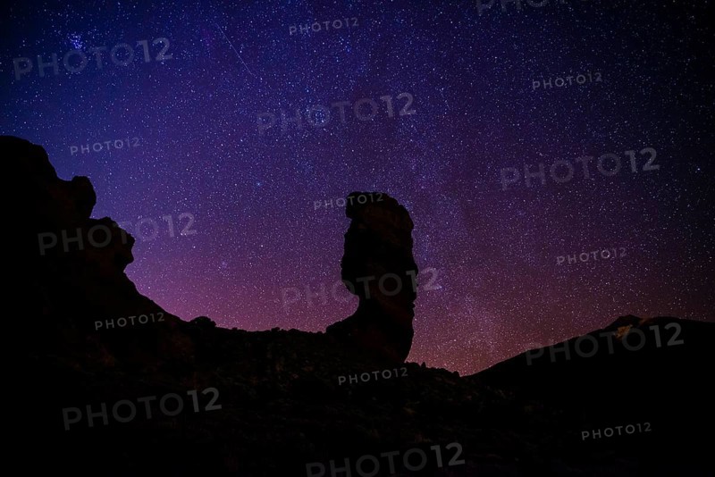 Roque Cinchado and Teide vulcano with starry sky