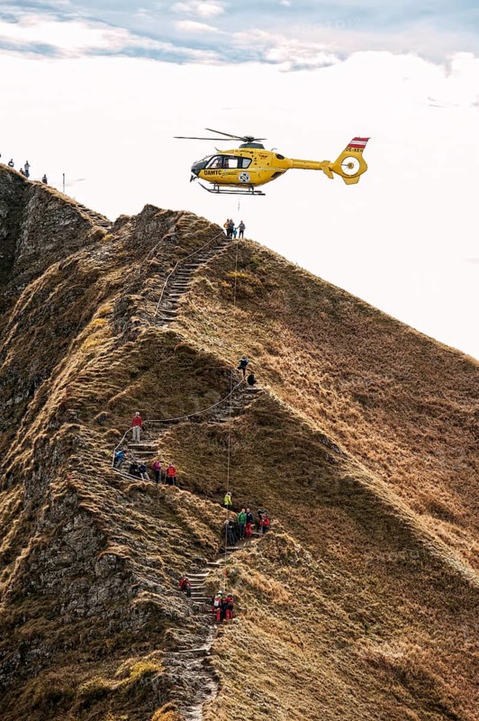 Mountain rescue by helicopter on the Fellhorn ridge