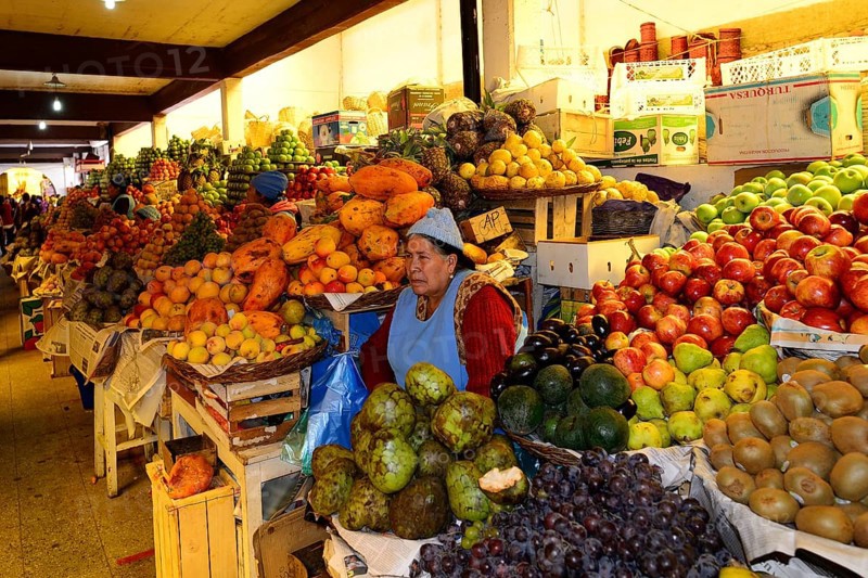 Sale of fruit at market stall