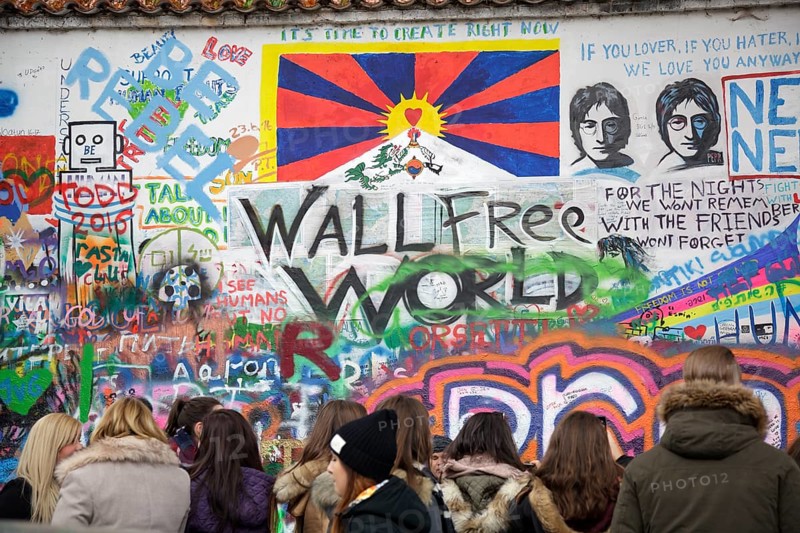 People visiting John Lennon Wall
