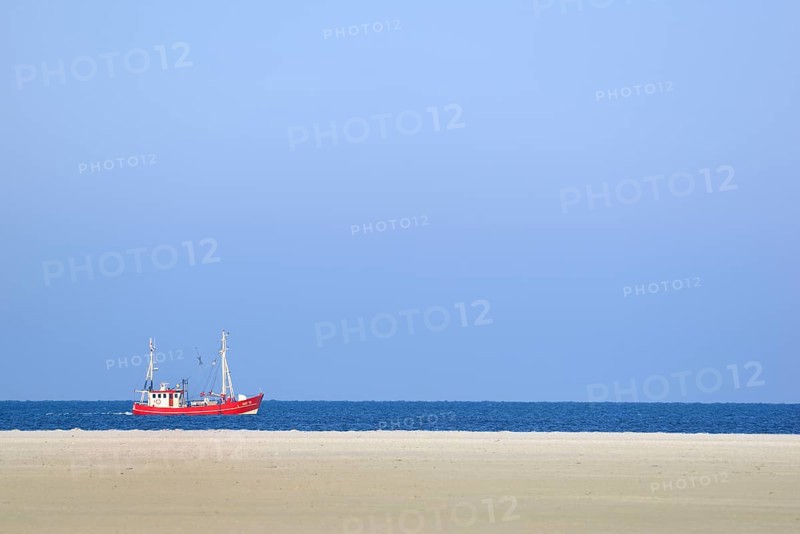 Red fishing boat in the North Sea
