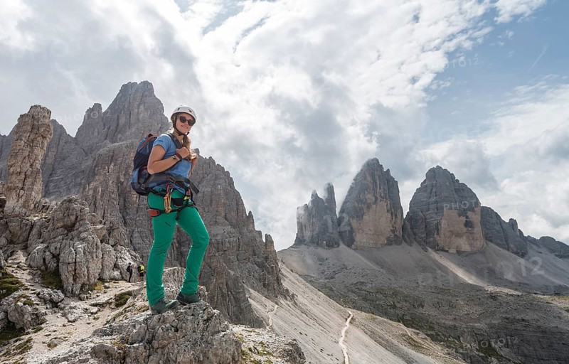 Hiker on the via ferrata to Paternkofel
