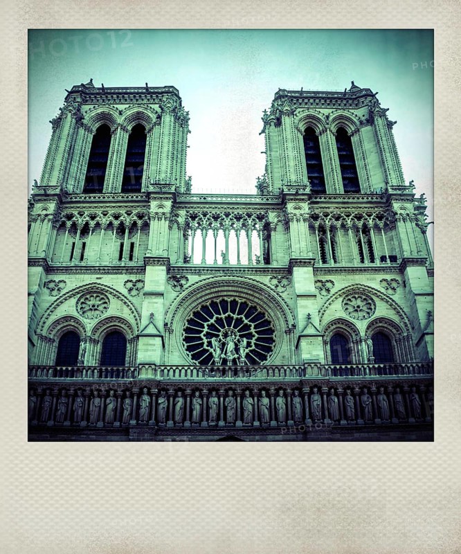 Vintage polaroid photo of facade of Notre Dame Cathedral