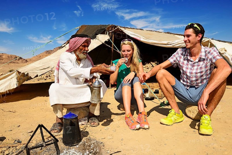 Bedouin preparing coffee with pan-roasted beans and kardamom