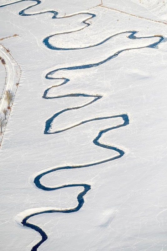 Meandering river Mohne in the snow