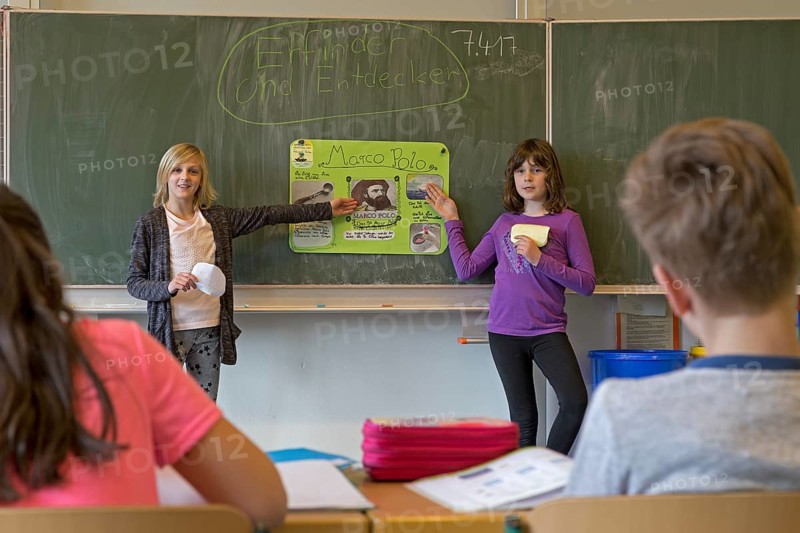 Students giving a presentation about Marco Polo