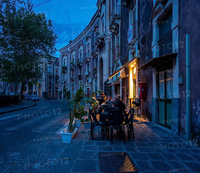 Patrons at a restaurant in the historic center
