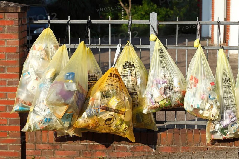 Yellow bags with plastic waste