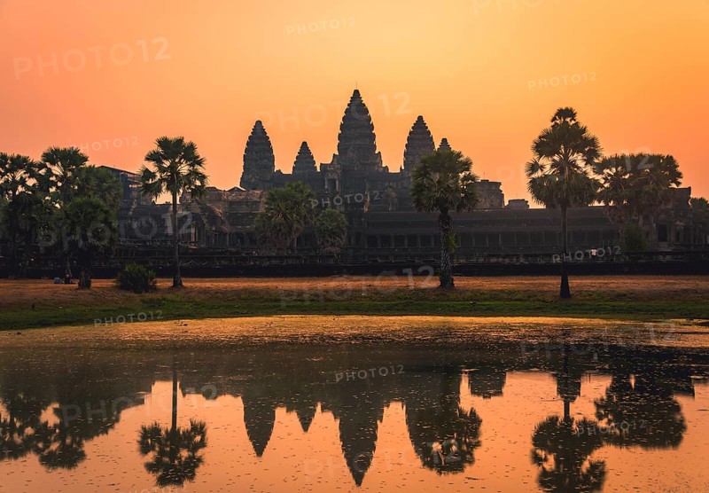 Temple complex of Angkor Wat reflected in the water basin