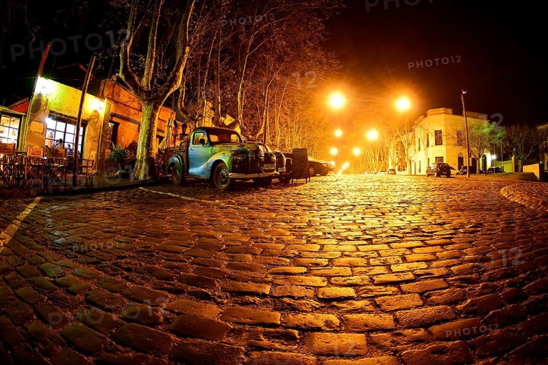 Oldtimer cars on cobblestone street