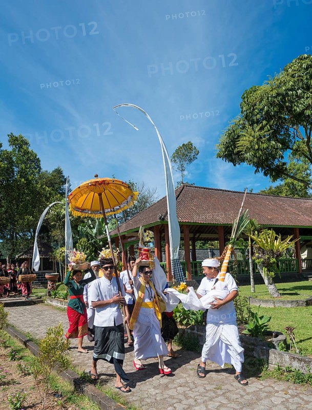 Procession of devout Buddhists with offerings
