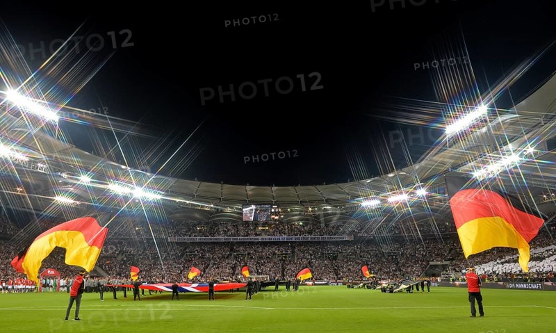 Flag waver with German flags in front of the start of the match