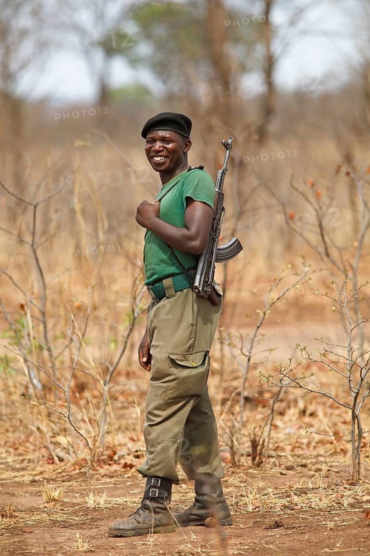 Gamekeeper with gun