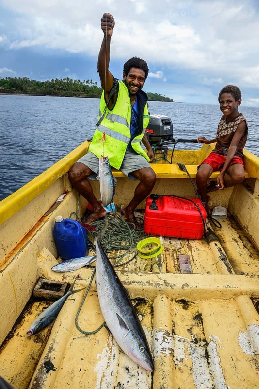 Fisherman in a boat while fishing