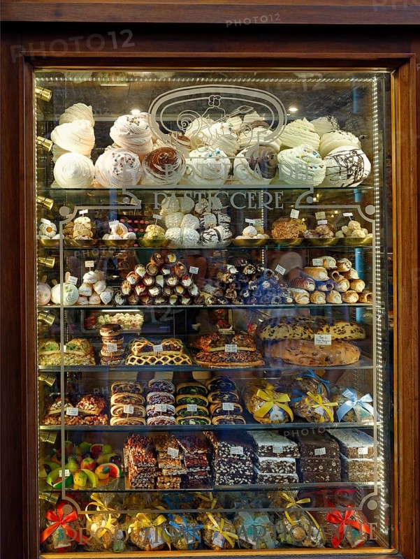 Display in shop window with pastry