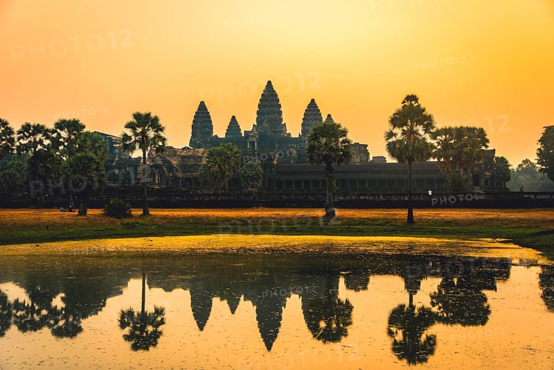 Temple complex of Angkor Wat reflected in the water basin