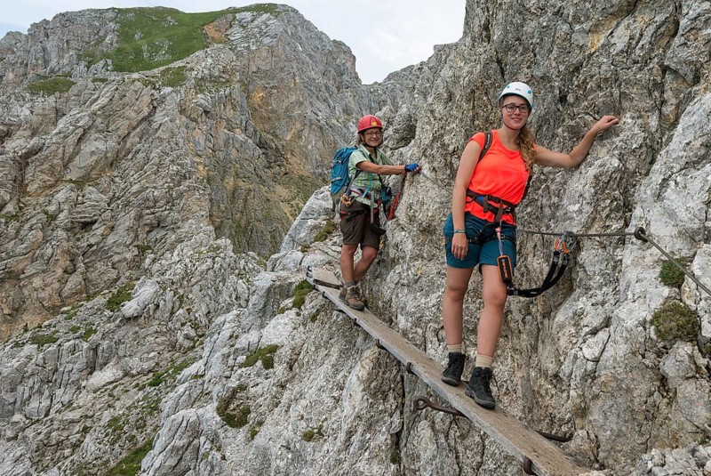 Hikers on via ferrata