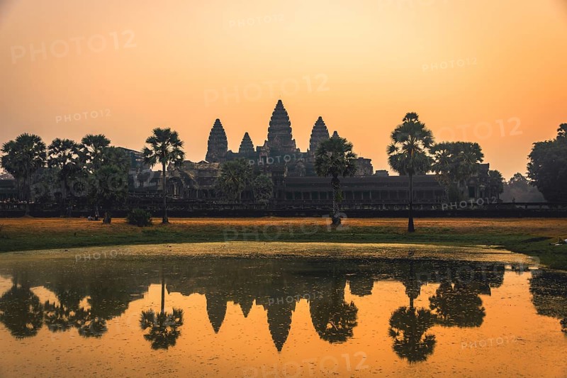 Temple complex of Angkor Wat reflected in the water basin
