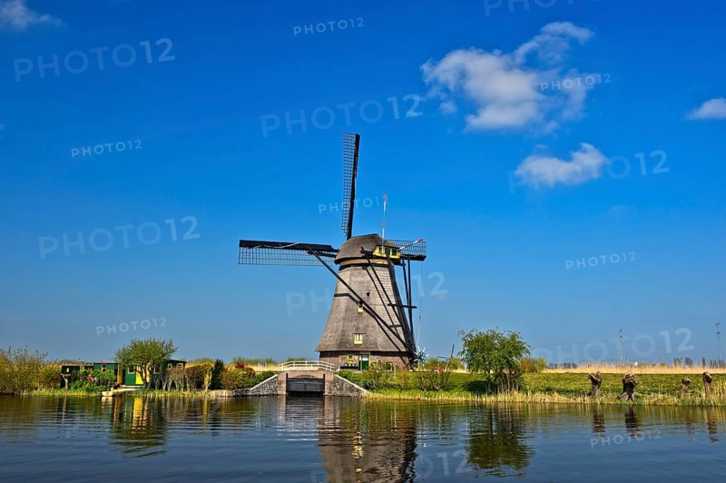 Dutch windmill over a canal
