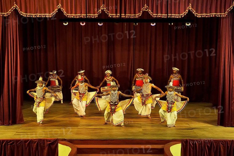 Drummers and dancers at a performance of Kandy dancers