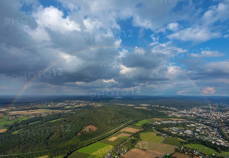 Cloud sky with rainbow over Neheim-Husten