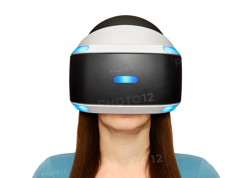 Woman wearing a Playstation VR headset
